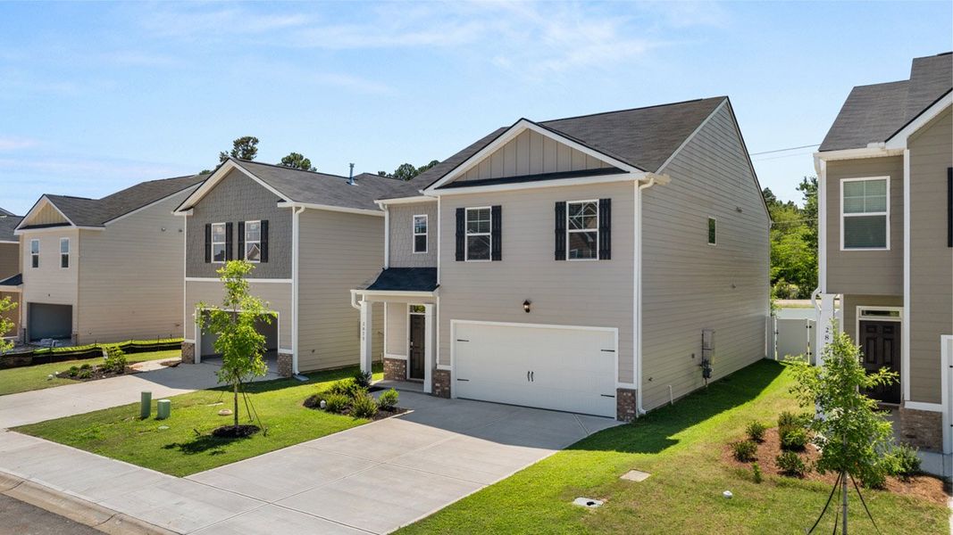 Front exterior of a new home in Estates at Deer Hollow, Grovetown, GA, highlighting curb appeal (Image 1).