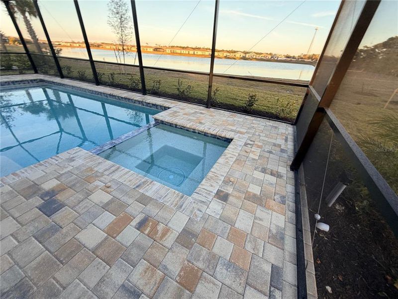 Exterior details and patio area of a home in Island Lakes at Coco Bay, Englewood (Image 9).
