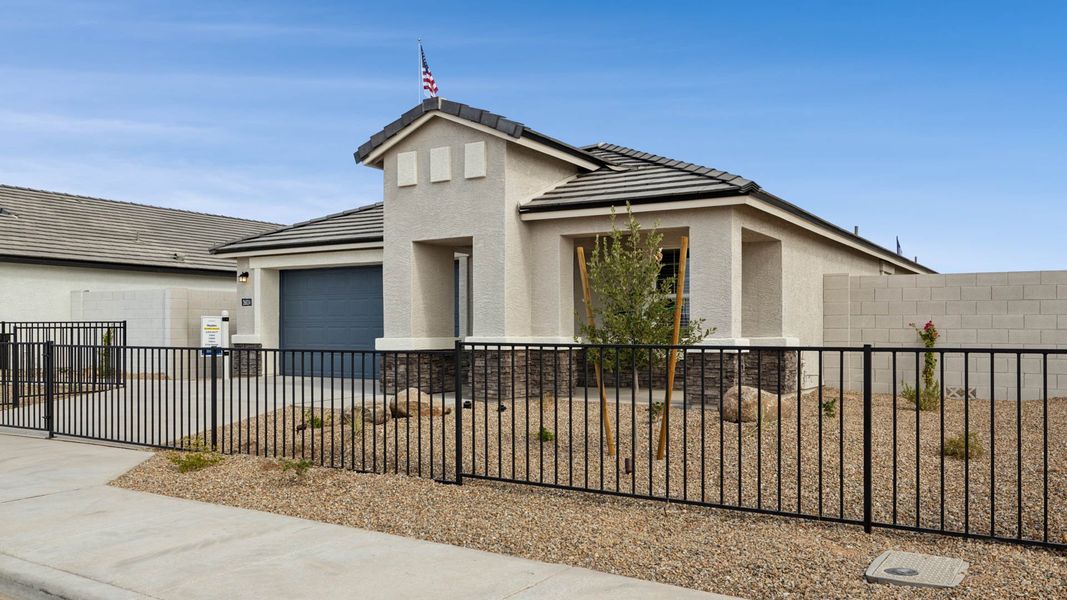 Representative exterior photo of a completed home built from the Hayden by D.R. Horton in Remington, Buckeye, AZ (Image 19).
