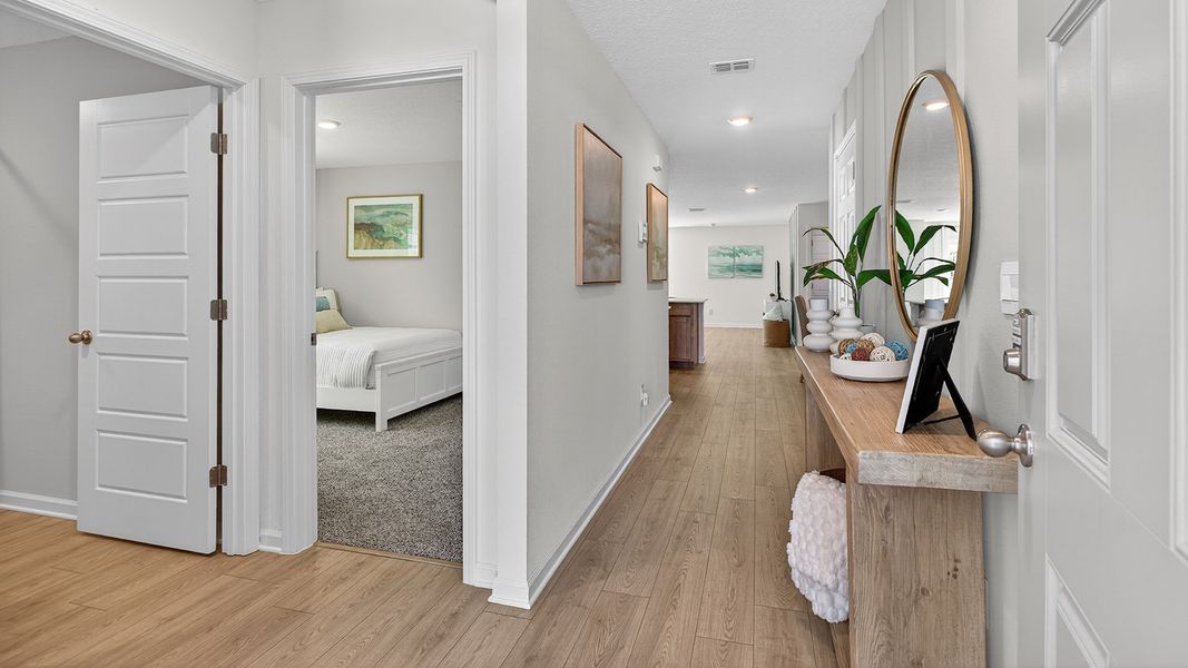 Representative furnished interior of a home built from the LAKESIDE by D.R. Horton in Copes Landing, Jacksonville (Image 6).