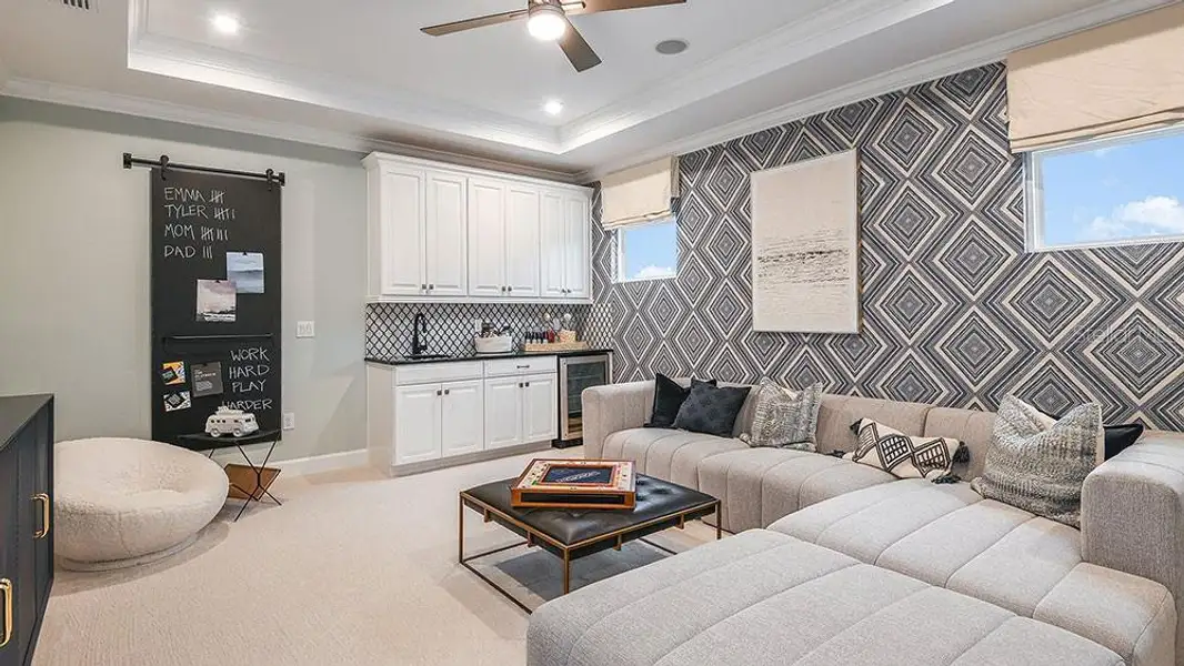 Furnished interior view inside a new home in Center Lake Ranch Community Group Page, St. Cloud (Image 11).