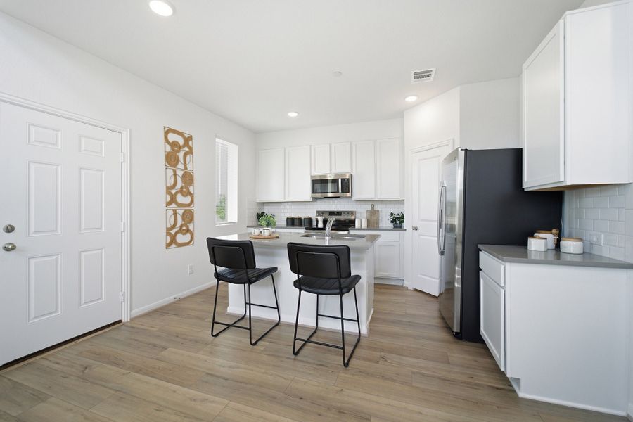 Representative furnished interior of a home built from the Eames by CastleRock Communities in Municipal Drive Townhomes, Leander (Image 11). Representative furnished interior of a home built from the Eames by CastleRock Communities in Municipal Drive Townhomes, Leander (Image 11).