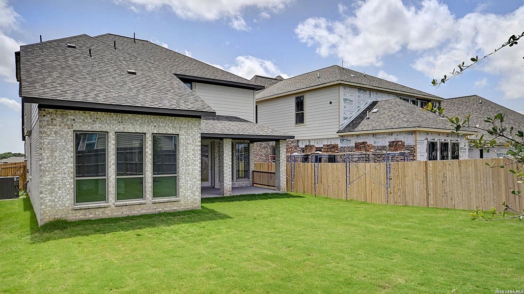 Exterior details and patio area of a home in Kallison Ranch, San Antonio (Image 24).