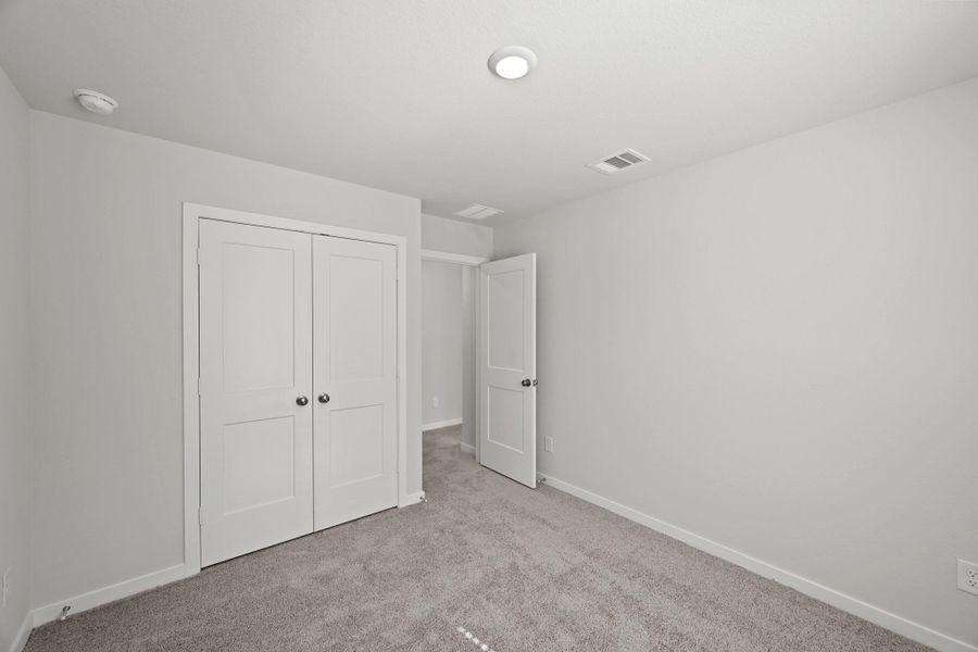 Spacious, unfurnished interior of a new home in Lonestar Collection at Paloma at Sanford Farms, Waller (Image 23).