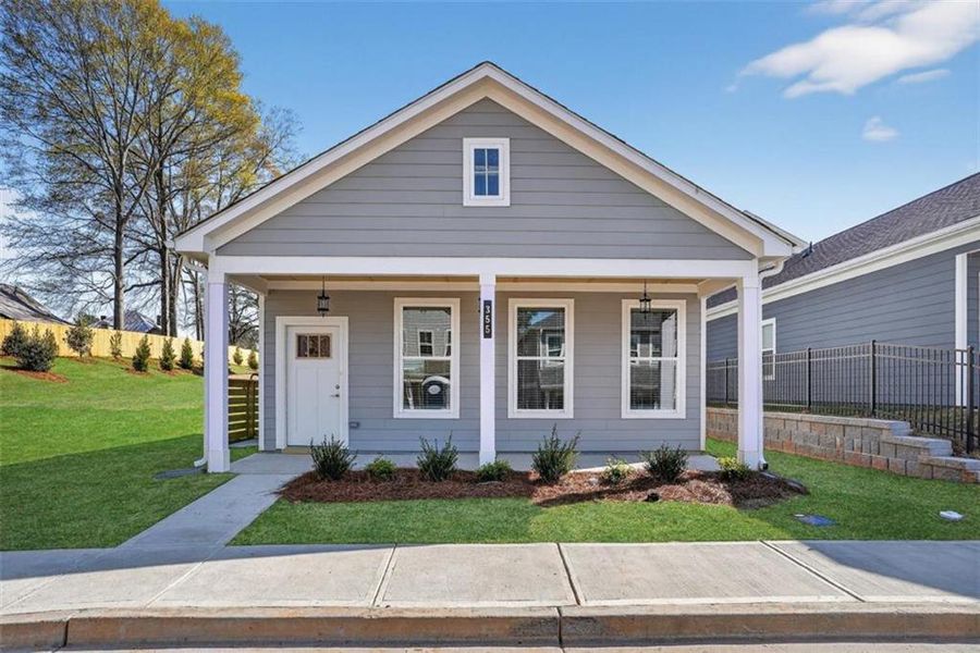Front exterior of a new home in , Fayetteville, GA, highlighting curb appeal (Image 15).