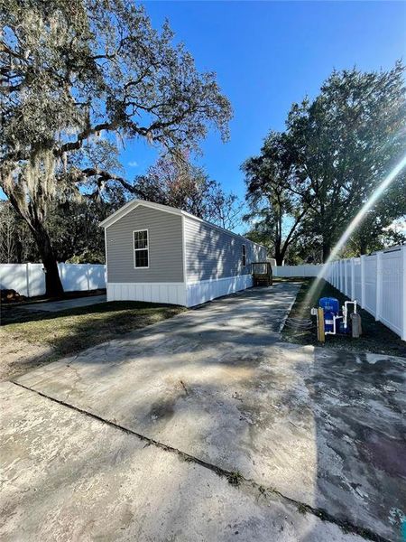 Exterior details and patio area of a home in , New Port Richey (Image 21).