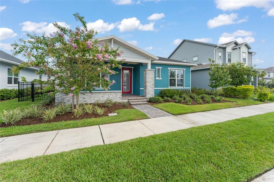 Front exterior of a new home in , Orlando, FL, highlighting curb appeal (Image 25).