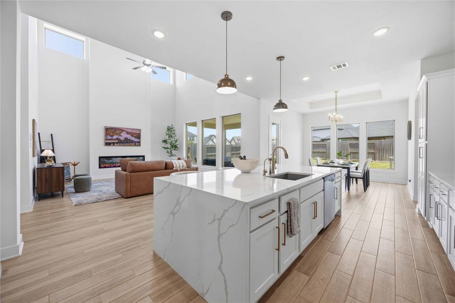 Seamlessly connecting living, dining, and kitchen spaces to create a refined yet comfortable lifestyle.