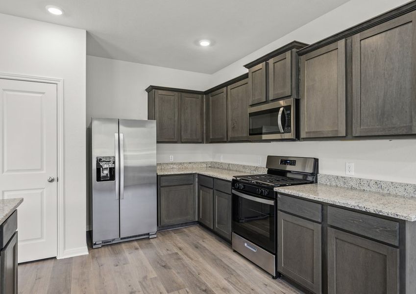 The kitchen has gorgeous wood cabinetry. The kitchen has gorgeous wood cabinetry.