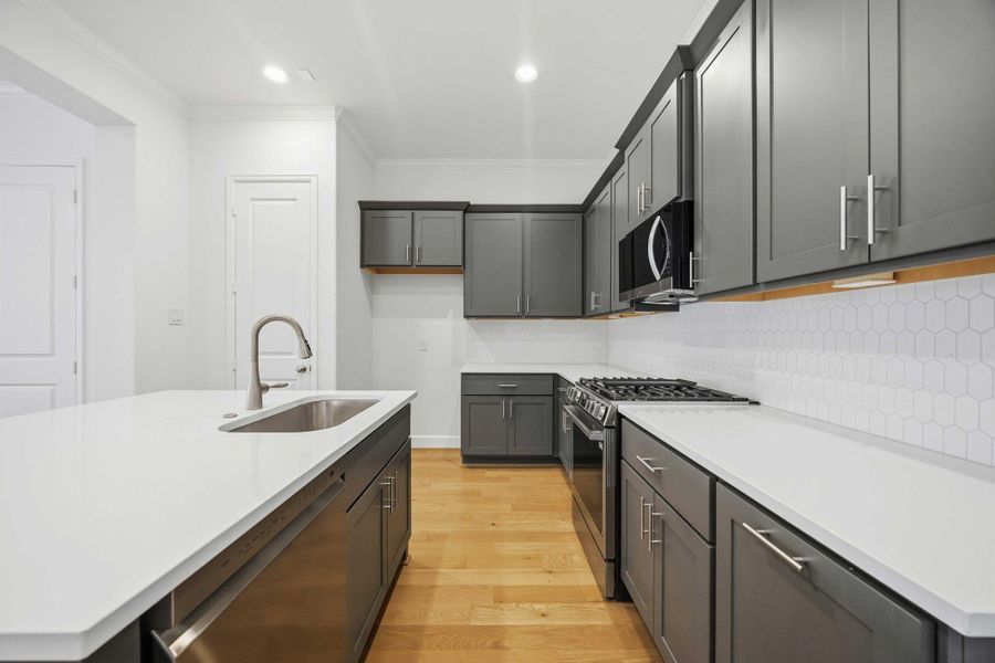 Pre-wired for pendant lights, this kitchen is ready to shine in any setting.