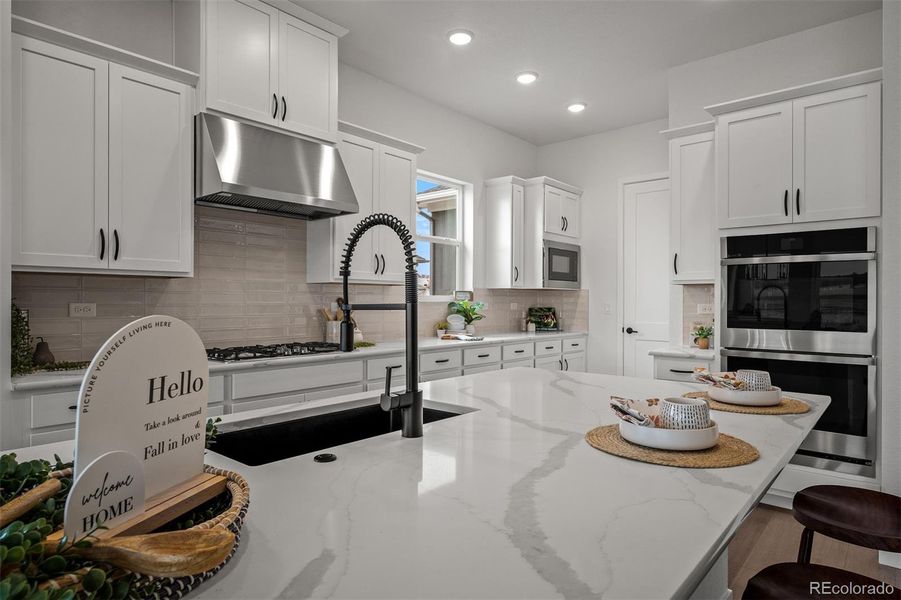 Furnished interior view inside a new home in Wolf Ranch - Enclave Collection, Colorado Springs (Image 11).