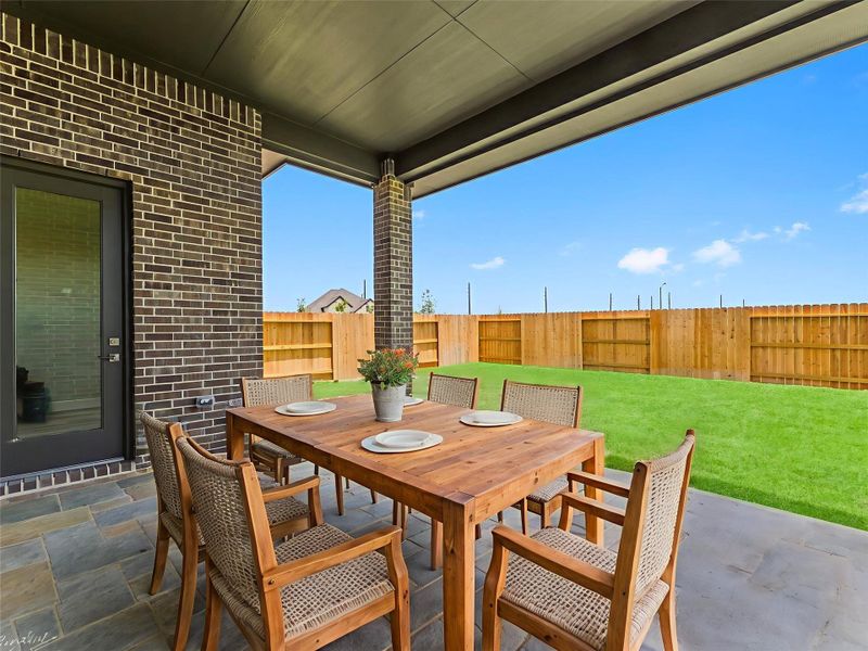 Exterior details and patio area of a home in The Grand Prairie 60’s, Hockley (Image 2). Exterior details and patio area of a home in The Grand Prairie 60’s, Hockley (Image 2).