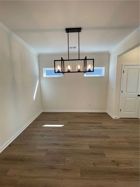 Spacious, unfurnished interior of a new home in Springwood Grove, Central (Image 9).