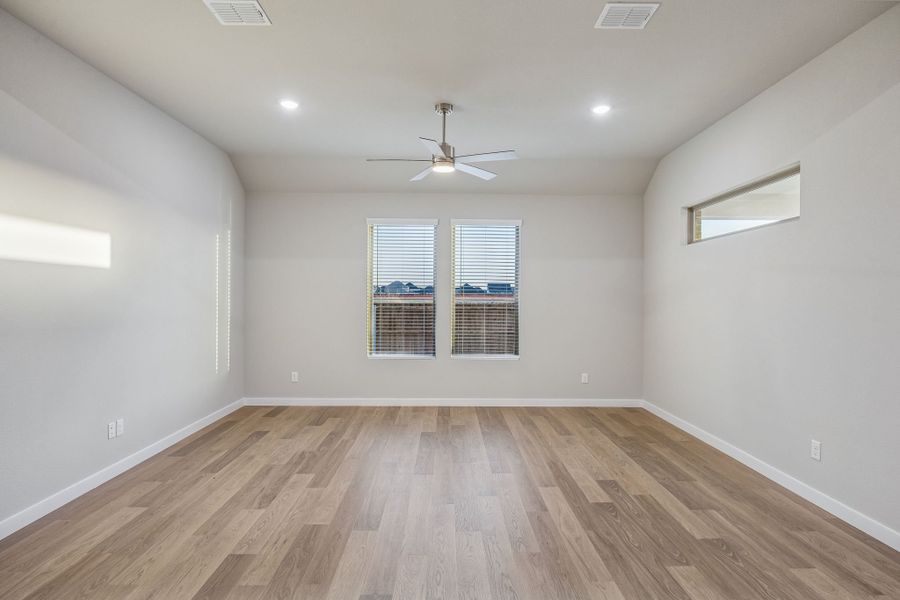 Living Room in the Wimbledon home plan by Trophy Signature Homes – REPRESENTATIVE PHOTO