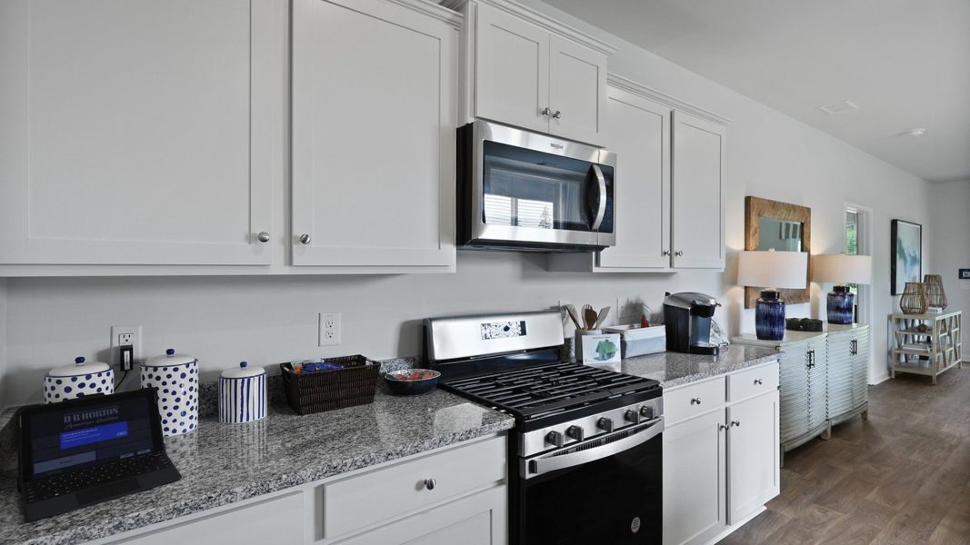 Representative furnished interior of a home built from the Glenwood by D.R. Horton in Pine Hills at Cane Bay, Summerville (Image 8).