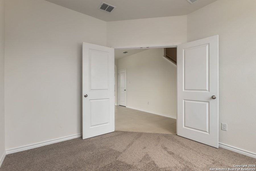Spacious, unfurnished interior of a new home in Hidden Bluffs at TRP, San Antonio (Image 5).