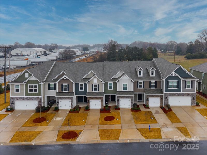 Front exterior of a new home in Secrest Landing, Monroe, NC, highlighting curb appeal (Image 22). Front exterior of a new home in Secrest Landing, Monroe, NC, highlighting curb appeal (Image 22).