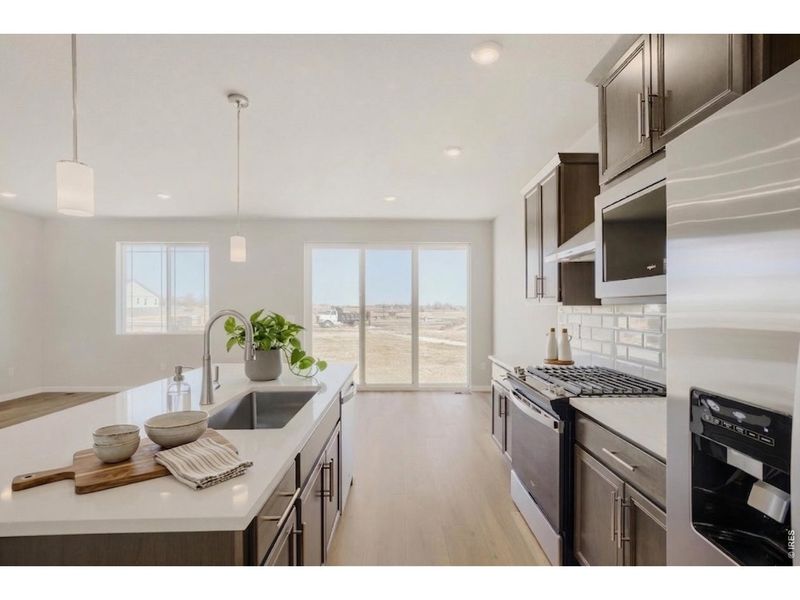 Furnished interior view inside a new home in Farmstead, Berthoud (Image 15).