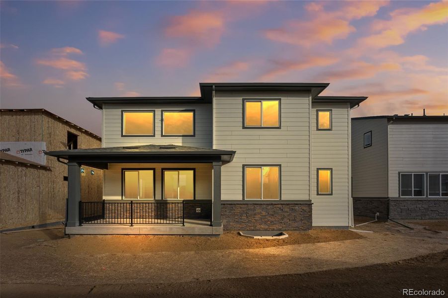 Exterior details and patio area of a home in Harvest Crossing, Aurora (Image 3).