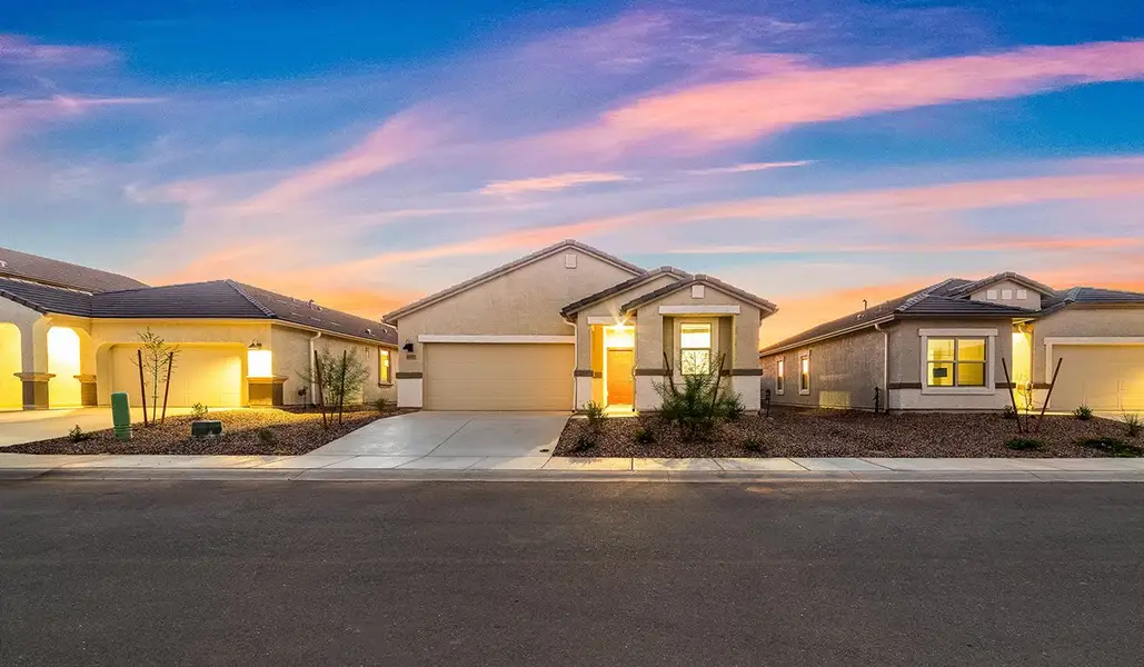 Front exterior of a new home in Saguaro Bloom, Marana, AZ, highlighting curb appeal (Image 2).