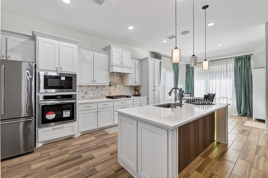 Furnished interior view inside a new home in , Little Elm (Image 26).