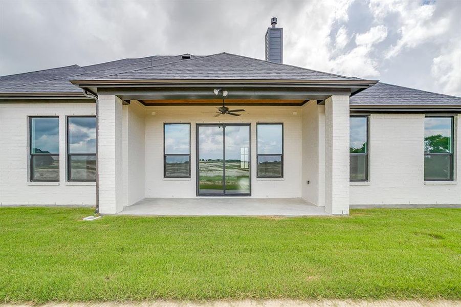 Exterior details and patio area of a home in Peaks at Lone Elm, Waxahachie (Image 20).