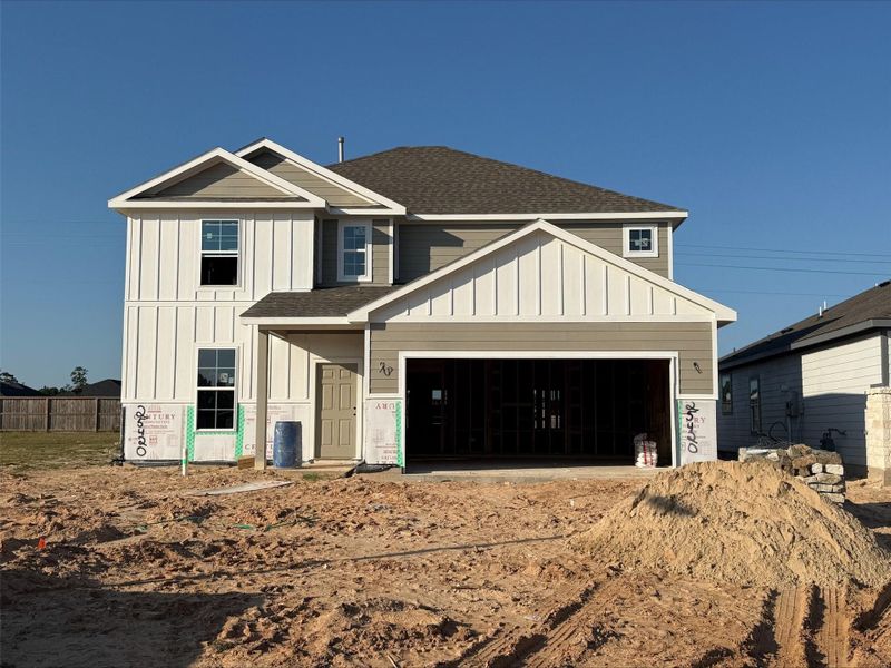 Front exterior of a new home in Magnolia Springs, Montgomery, TX, highlighting curb appeal (Image 2). Front exterior of a new home in Magnolia Springs, Montgomery, TX, highlighting curb appeal (Image 2).