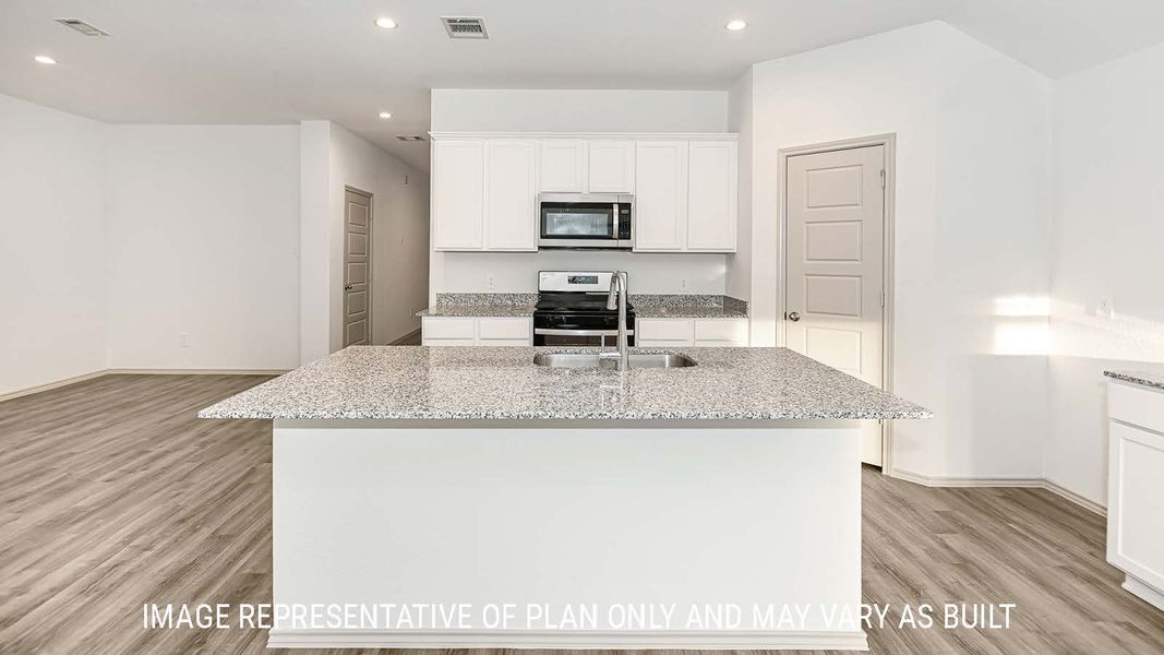 Representative furnished interior of a home built from the Lakeway by D.R. Horton in Highland Village, Nome (Image 5).