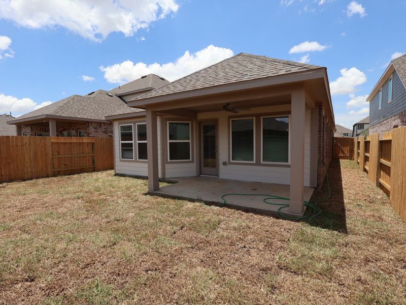 Exterior details and patio area of a home in Marvida, Cypress (Image 3).