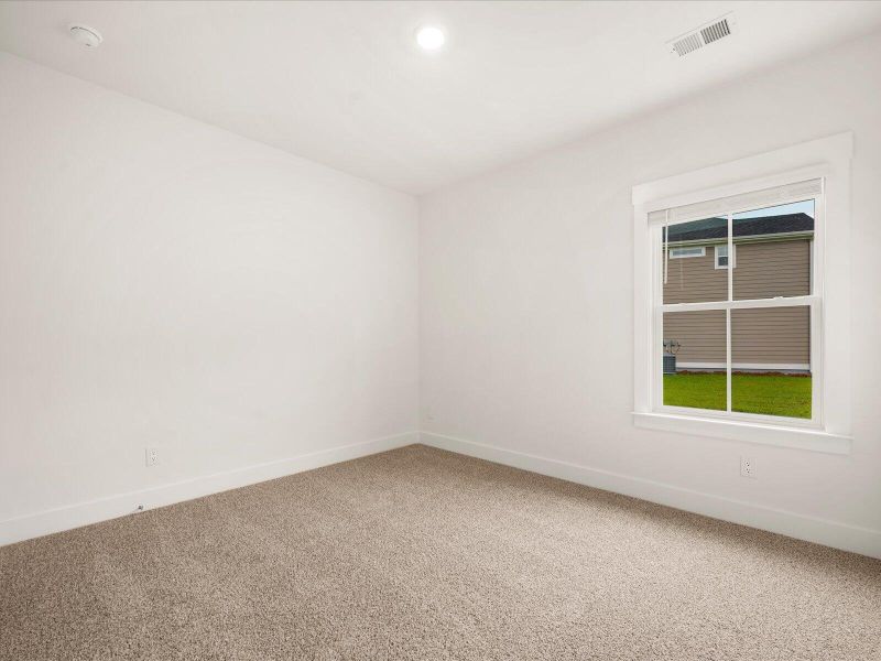 Spacious, unfurnished interior of a new home in The Coves at Lakes of Cane Bay, Summerville (Image 18). Spacious, unfurnished interior of a new home in The Coves at Lakes of Cane Bay, Summerville (Image 18).