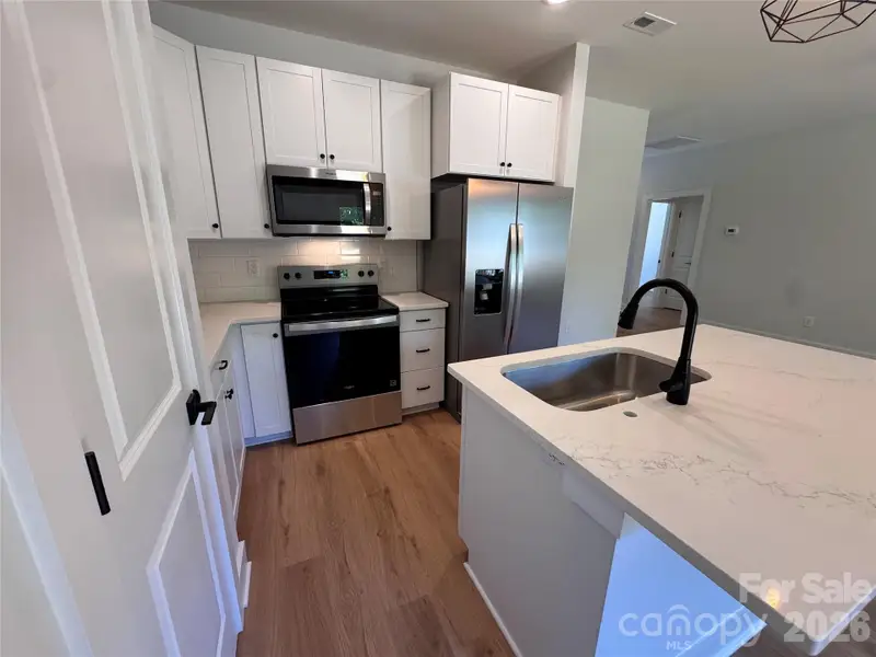 Furnished interior view inside a new home in , Gastonia (Image 6).