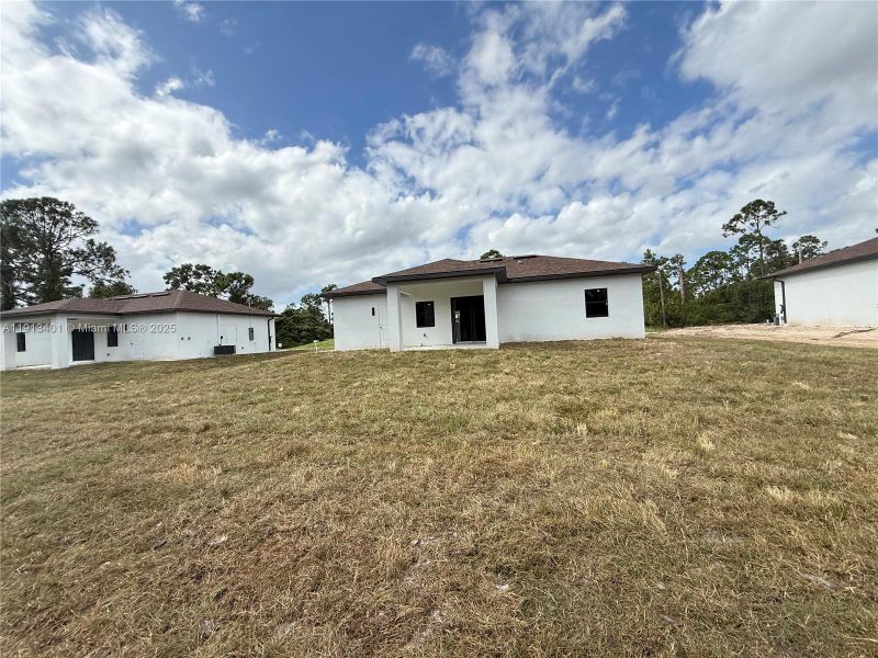 Exterior details and patio area of a home in , Lehigh Acres (Image 4). Exterior details and patio area of a home in , Lehigh Acres (Image 4).
