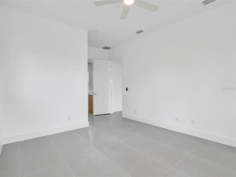 Spacious, unfurnished interior of a new home in , Port Charlotte (Image 24).