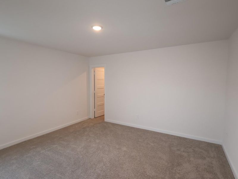 Spacious, unfurnished interior of a new home in Wildrye, Waller (Image 19).