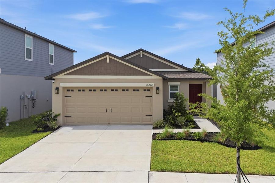 Front exterior of a new home in , Zephyrhills, FL, highlighting curb appeal (Image 23).