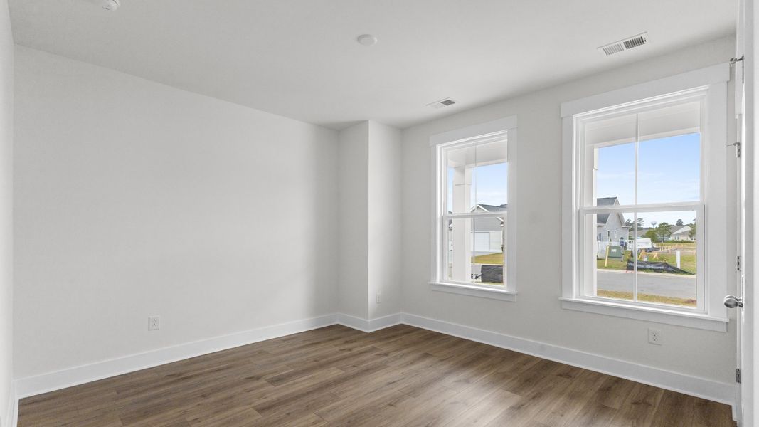 Furnished interior view inside a new home in Bluffs at Sun Colony, Longs (Image 16).