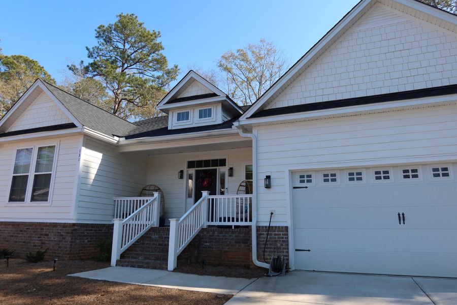 Exterior details and patio area of a home in , Santee (Image 28).