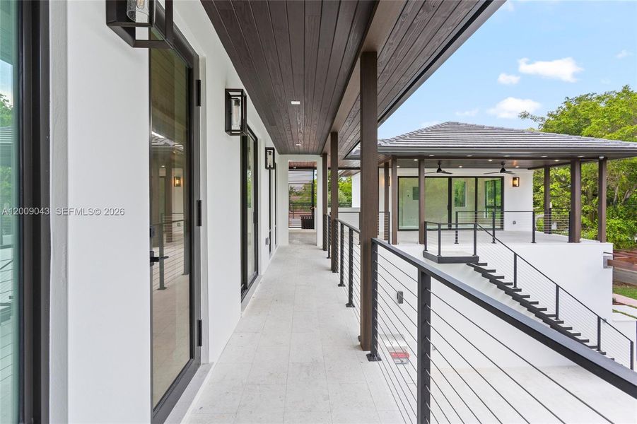 Exterior details and patio area of a home in , Coral Gables (Image 31).