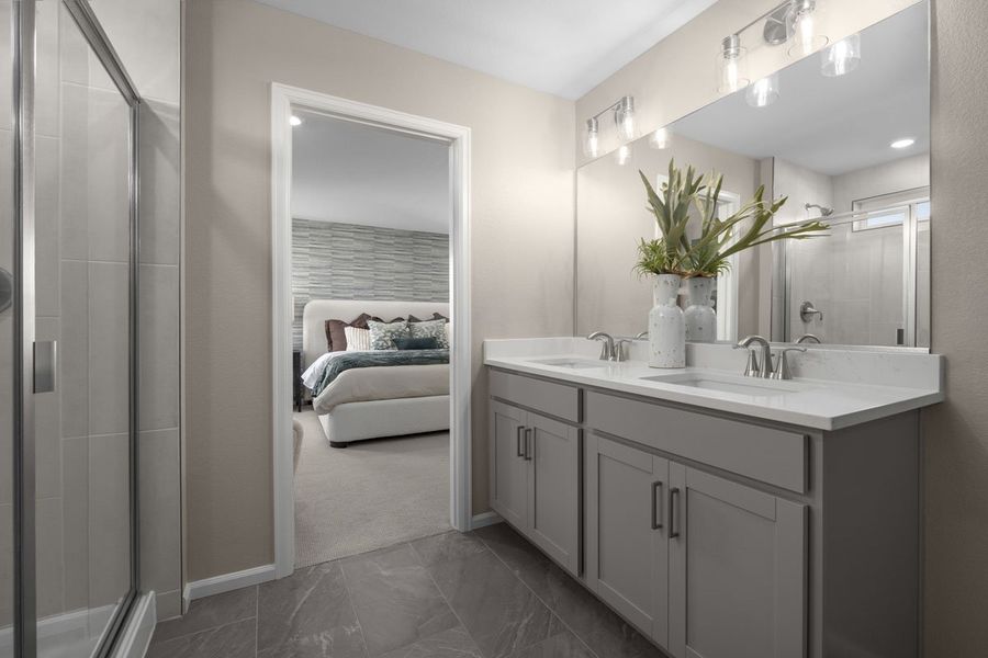 Dual-sink vanity at primary bathroom