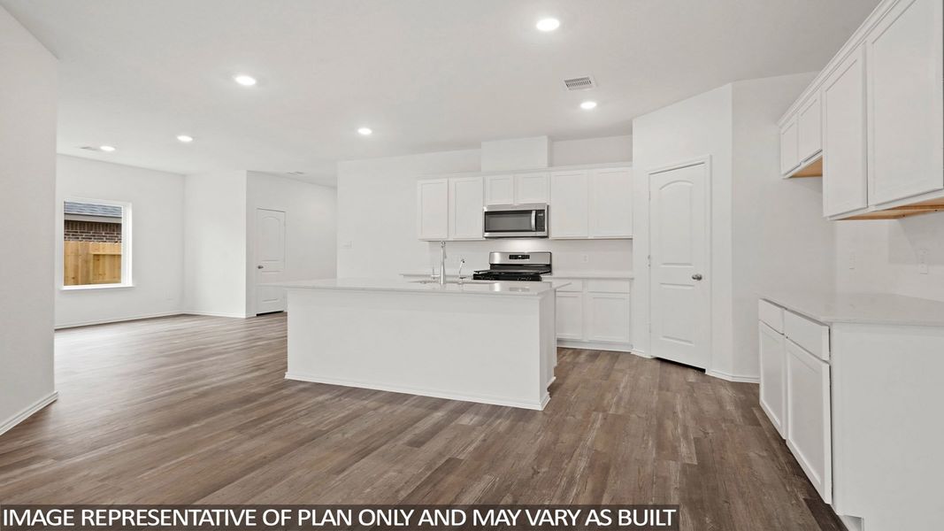 Furnished interior view inside a new home in Sunterra, Katy (Image 6).
