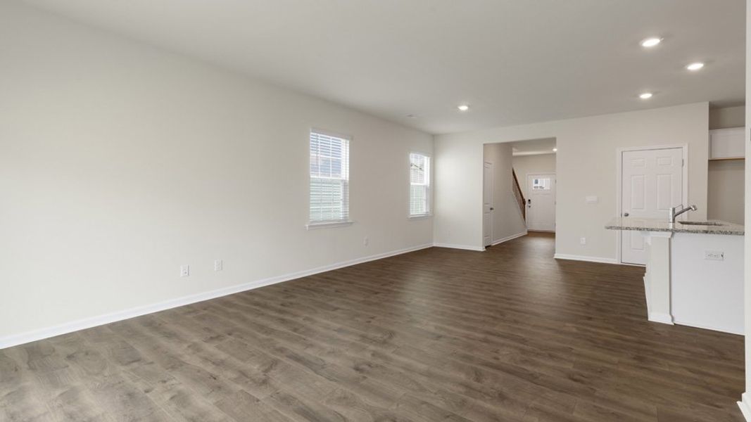 Spacious, unfurnished interior of a new home in The Grove at Matthews Landing, Fuquay Varina (Image 11).