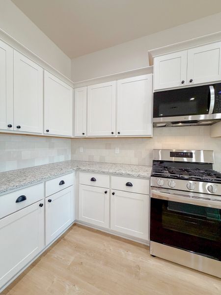 Furnished interior view inside a new home in TerraVista, Victoria (Image 14).