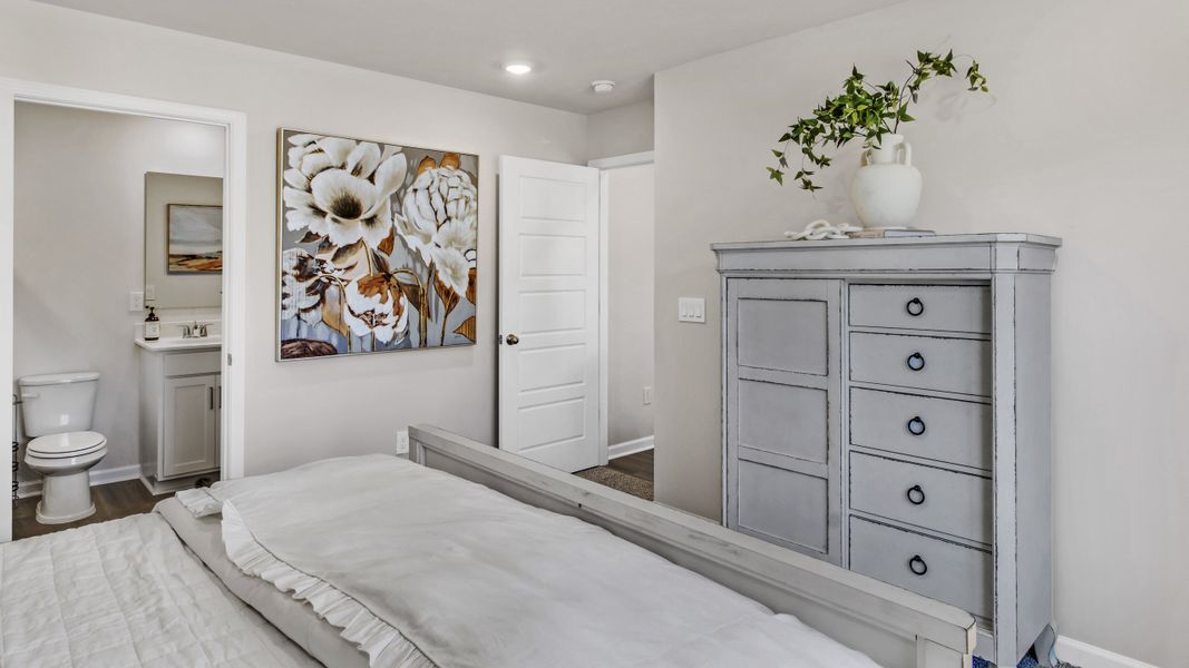 Representative furnished interior of a home built from the Freeport by D.R. Horton in Bailey Park, Fayetteville (Image 27).