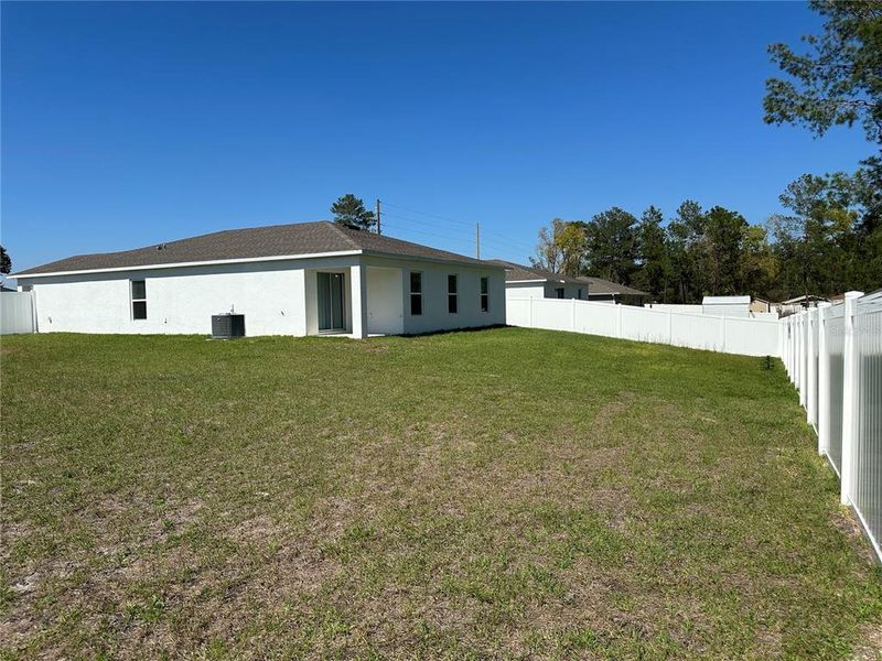 Exterior details and patio area of a home in Marion Oaks, Ocala (Image 28).