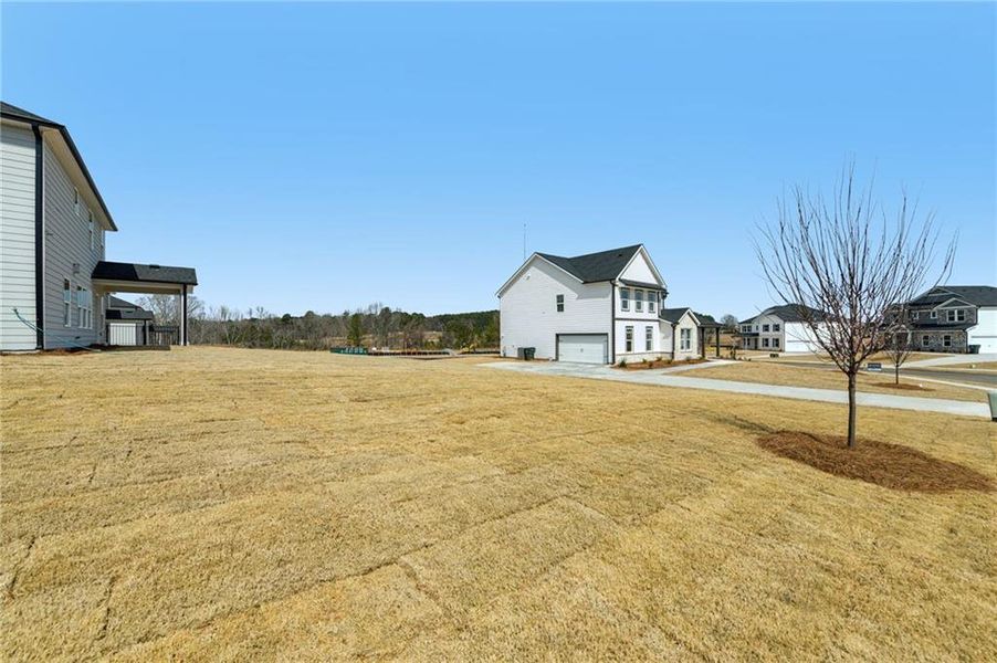 Exterior details and patio area of a home in River Pointe, Monroe (Image 33).