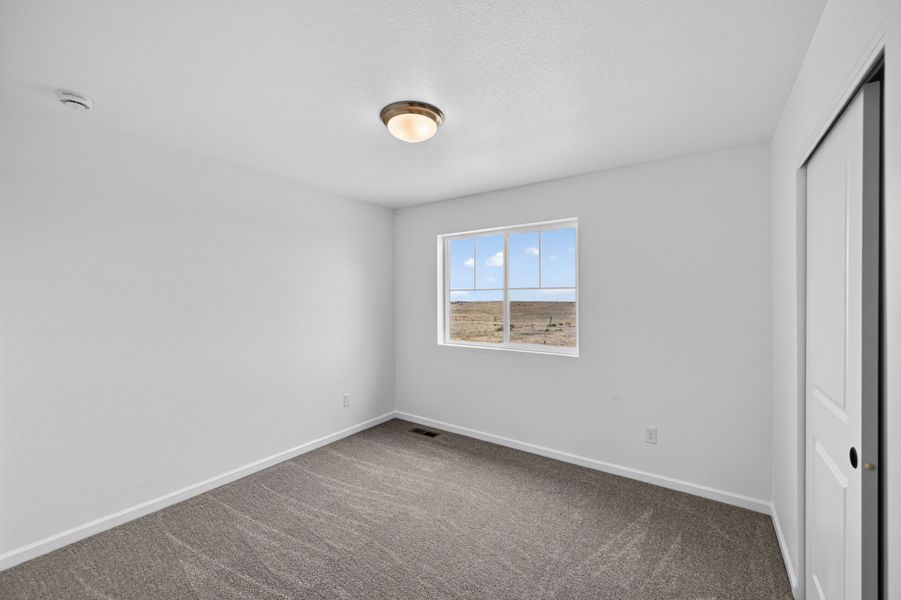Spacious, unfurnished interior of a new home in The Town Collection at Independence, Elizabeth (Image 15).