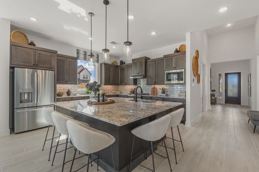 Representative furnished interior of a home built from the Nicklaus by Chesmar Homes in Riceland Alley Loads, Mont Belvieu (Image 52).