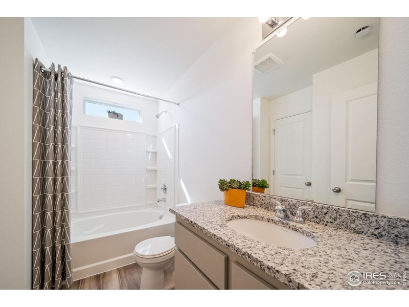 Furnished interior view inside a new home in Thompson River Ranch, Johnstown (Image 7).