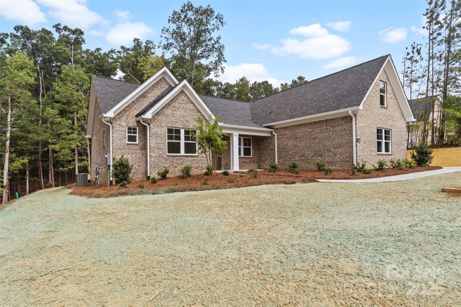 Front exterior of a new home in , Lancaster, SC, highlighting curb appeal (Image 21).