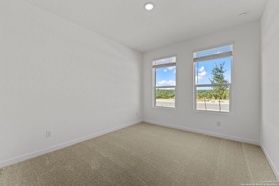 Spacious, unfurnished interior of a new home in Waterwheel: Coastline Collection, San Antonio (Image 15).